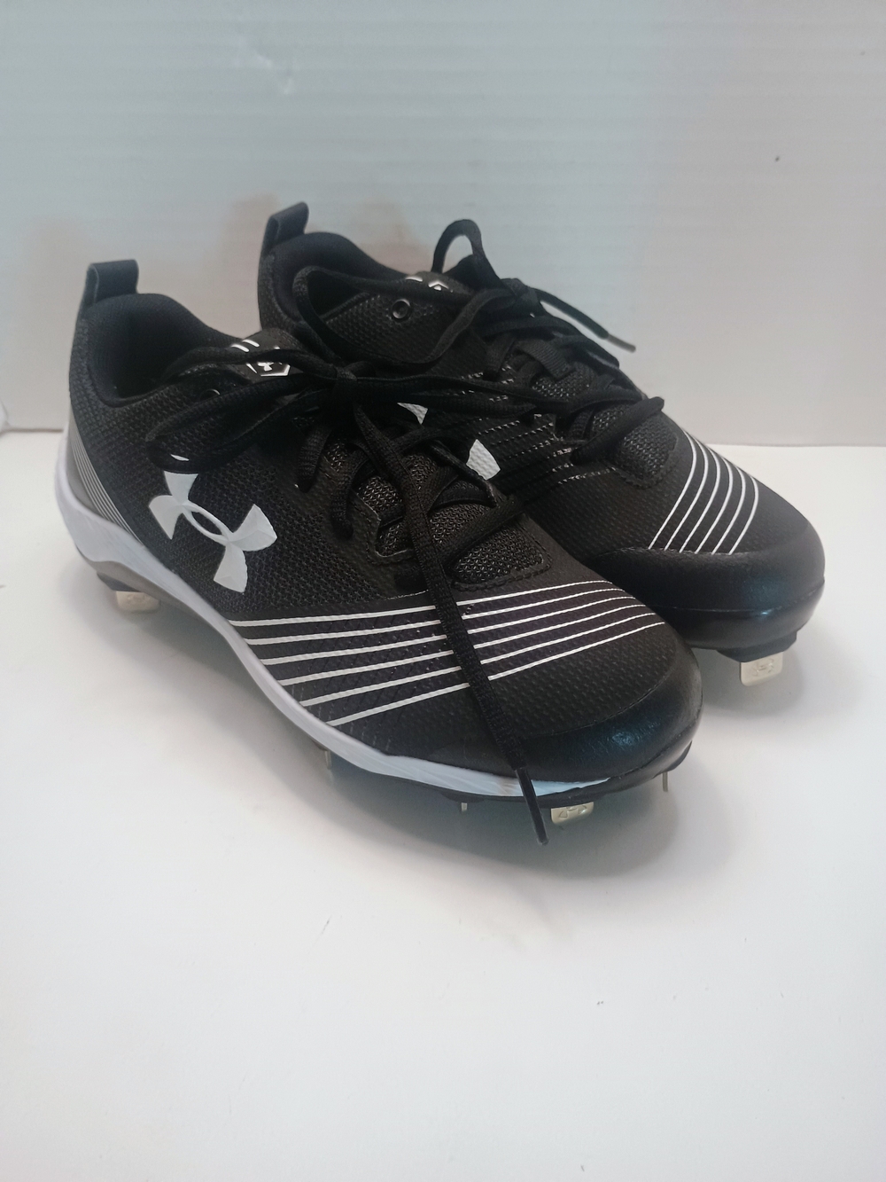 Under Armour Black and White Athletic Cleats